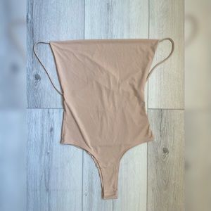Cute beige bodysuit